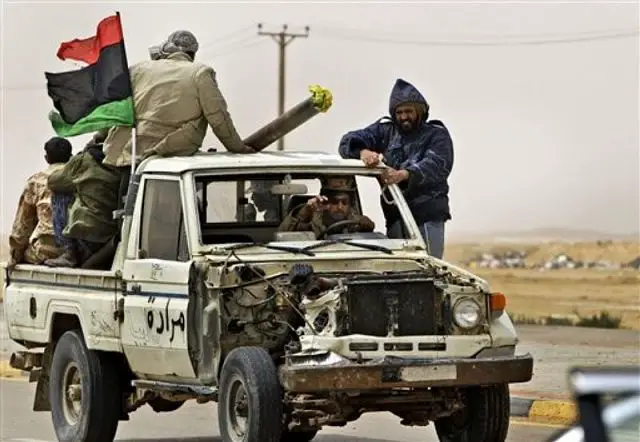 From CBSNEWS - The United States may consider sending troops into Libya with a possible international ground force that could aid the rebels, according to the general who led the military mission until NATO took over.