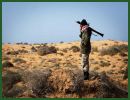 Forces loyal to Muammar Gaddafi are resisting an advance by Libyan rebels towards the embattled Libyan leader's hometown of Sirte in the fiercest clashes since the start of a sweeping offensive that has brought a string of coastal towns under opposition control.