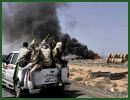 Libyan Rebel forces bore down Monday on Moammar Gadhafi's hometown of Sirte, a key government stronghold where a brigade headed by one of the Libyan leader's sons was digging in to defend the city and setting the stage for a bloody and possibly decisive battle.