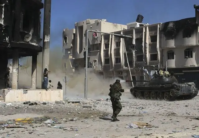 Libyan interim government forces say they have entered Bani Walid, one of the last outposts still loyal to deposed leader Muammar Gaddafi, with National Transitional Council fighters saying they now control about 60 per cent of the town. .