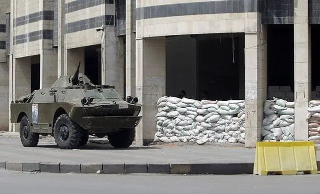 Syrian tanks pounded a town on a strategic highway overnight, injuring at least three people during a military crackdown on dissent in the central region of Homs, activists and residents said on Monday, Reuters reported.