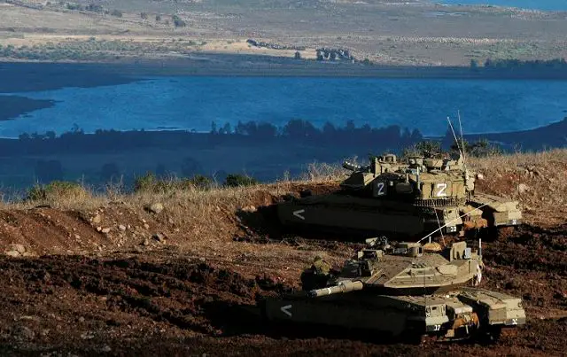 Israel's army fired tank shells that struck a Syrian armored unit after a mortar shell exploded near an army post in the Golan Heights Monday, November 12, 2012, officials said. It was the second time in 24 hours Israel fired back after stray mortar shells came from Syria, an army statement said.
