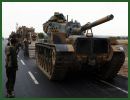 Turkey bolstered military presence on the border with Syria by deploying 250 tanks and 55 jets of various models on Friday, October 12, 2012, after a Syrian military helicopter bombed the Syrian border town of Azmarin.