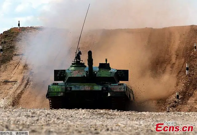 The Russian “Tank Biathlon-2014” International Competition kicked off at the Alabino Firing Range in the outskirt of Moscow on August 4, 2014. The Chinese team participated in the competition for the first time with Chinese-made Type 96A main battle tank, and hit all targets in the single-tank shooting event that day.