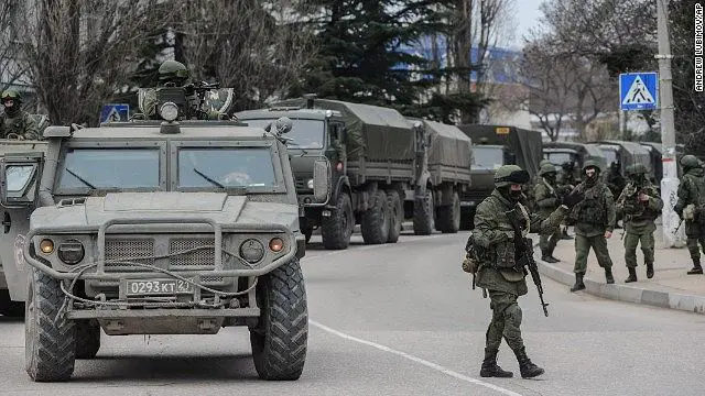 Leaders of a shaky new government in Ukraine were mobilizing troops Sunday, March 2, 2014, amid signs of Russian military intervention in Ukraine's Crimean peninsula. The Ukrainian National Security Council ordered the mobilization as Russian President Vladimir Putin appeared to dismiss warnings from world leaders to avoid military intervention in Crimea. 
