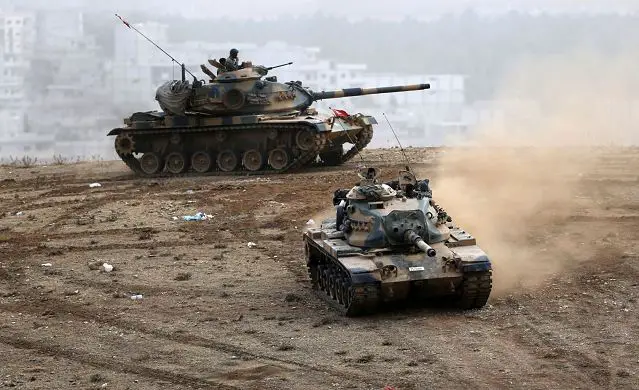 Turkey has deployed additional heavy weapons, including main battle tanks, along the border with neighboring Syria, private Dogan News Agency reported on Thursday, 6 November 2014.