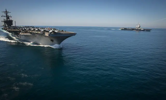 Official U.S. Navy file photo of the French navy nuclear aircraft carrier Charles de Gaulle (R91). Commander, French Maritime Force, Rear Adm. Rene-Jean Crignola, embarked in Charles de Gaulle, took command of U.S. Naval Forces Central Command's Task Force 50 Dec. 7. CTF 50 plans and conducts strike operations in the U.S. 5th Fleet area of operations.