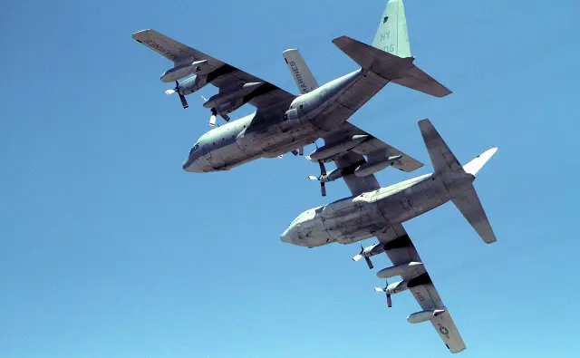 Two KC-130T Hercules aircrafts flown by the Air Combat Element of Black Sea Rotational Force 11, perform a “section overhead break". Photo by Cpl. Tatum Vayavananda