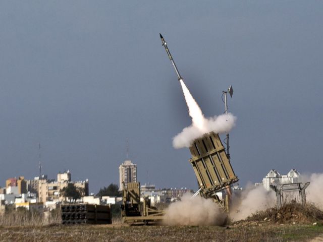 Israel deployed an Iron Dome missile defense battery along its northern border with Syria and planned a high-level security meeting in anticipation of retaliation for an airstrike that killed Lebanese Hezbollah militants and an Iranian general, Israel Radio reported.