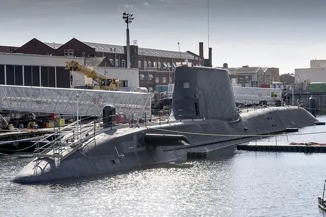 The UK Defence Secretary confirmed the news as he visited the home of the UK’s submarine manufacturing industry in Cumbria today. Artful, which will provide the Royal Navy with its most technologically advanced submarine, is currently preparing to leave the construction yard in Barrow-in-Furness for sea trials, before joining the Royal Navy fleet around the end of this year. The seven Astute Class submarines support the jobs of 3,700 workers and 400 supply companies across the UK supply chain.