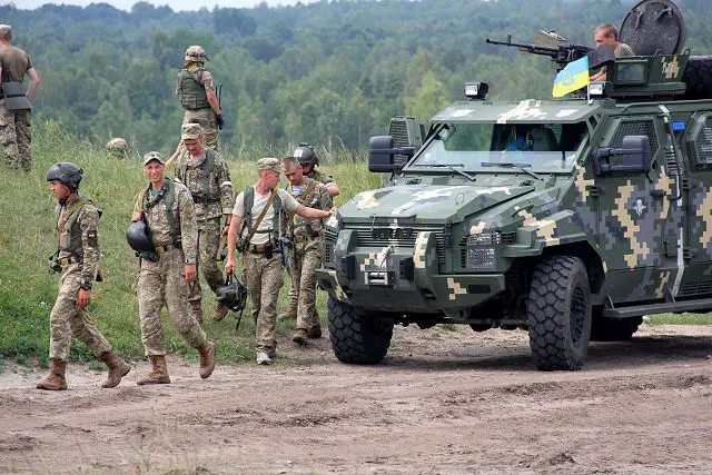 Ukrainian soldiers with KrAZ-Spartan 4x4 armoured vehicles at Rapid-Trident 2016 exercises 640 002