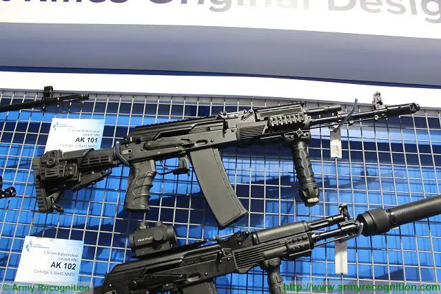 The AK-101 assault rifle is chambered for 5.56x45 mm cartridges. According to the specifications, it has a caliber of 5.56 mm, an effective firing range of 1,000 m, a firing rate of 600 rounds per minute, a muzzle velocity of 910 m/s, a length of 943 mm (without bayonet, buttstock extended), a barrel length of 415 mm, a weight of 3.6 kg with empty magazine and of 4 kg with loaded magazine, and a magazine capacity of 30 roun