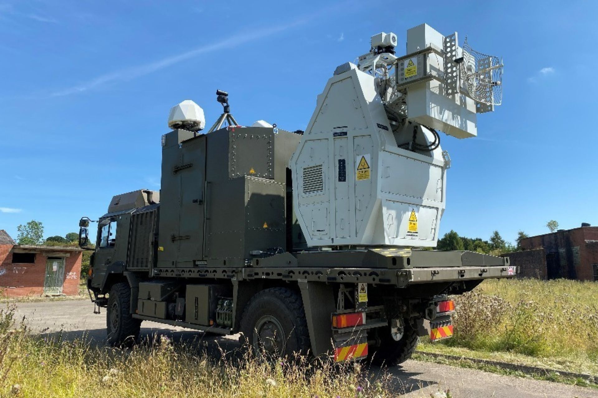 UK RF directed-energy demonstrator mounted on a truck during counter-UAS trials, 2025