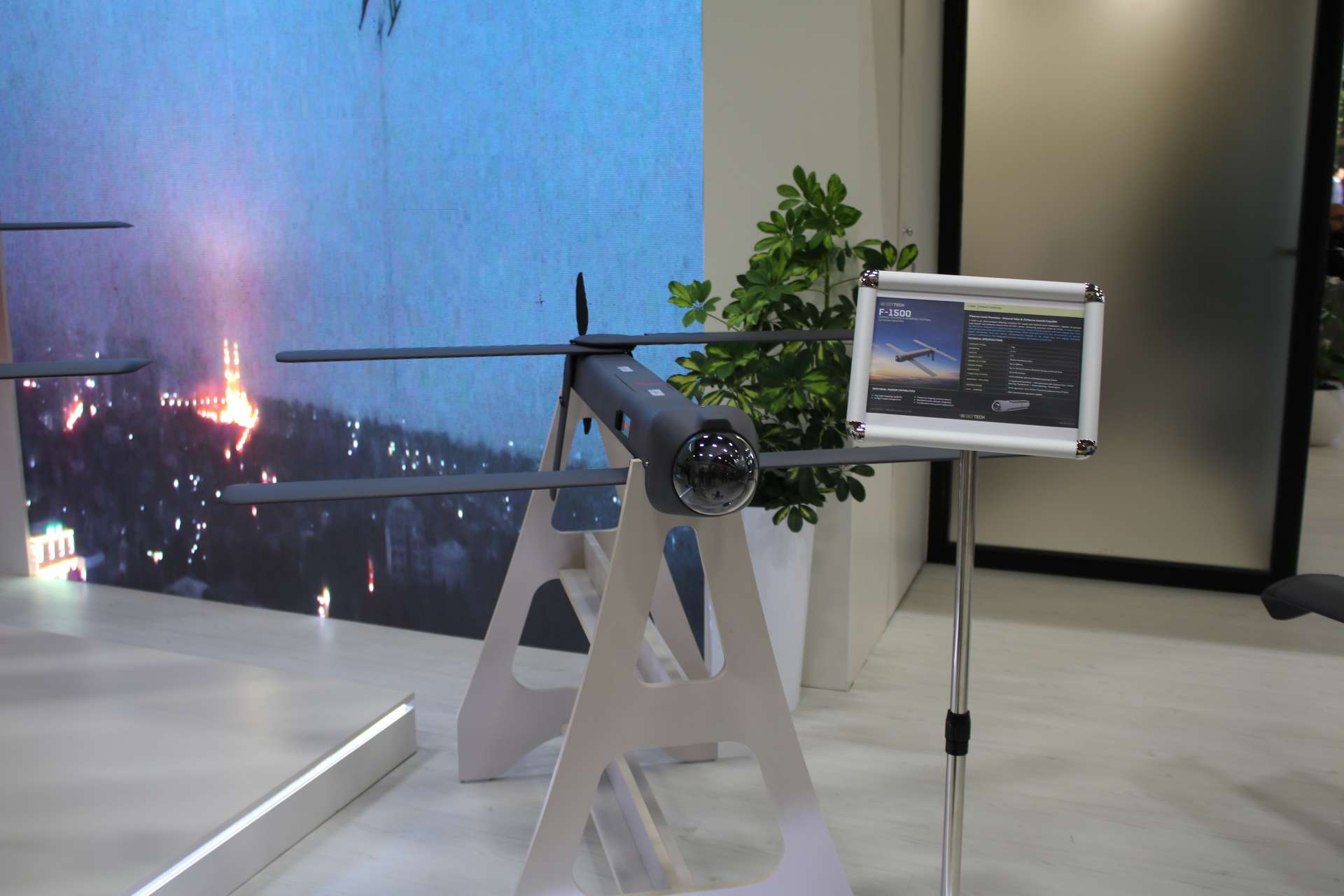 Azerbaijan’s DEFTECH unveiled its F-1500 tactical loitering munition at ADEX 2026, offering small combat units precision strikes at up to 20 km from the ground and 50 km when launched from the DT-001 carrier (Picture Source: Army Recognition Group)