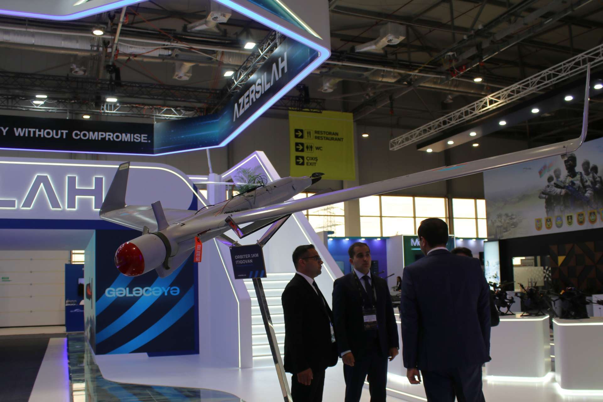 Azersilah showcased its ORBITER 1KM tactical surveillance UAV at ADEX 2026 in Baku, highlighting a compact electric aircraft with a 100 km radio range, 2.5-hour endurance and runway-independent catapult launch (Picture Source: Army Recognition Group)