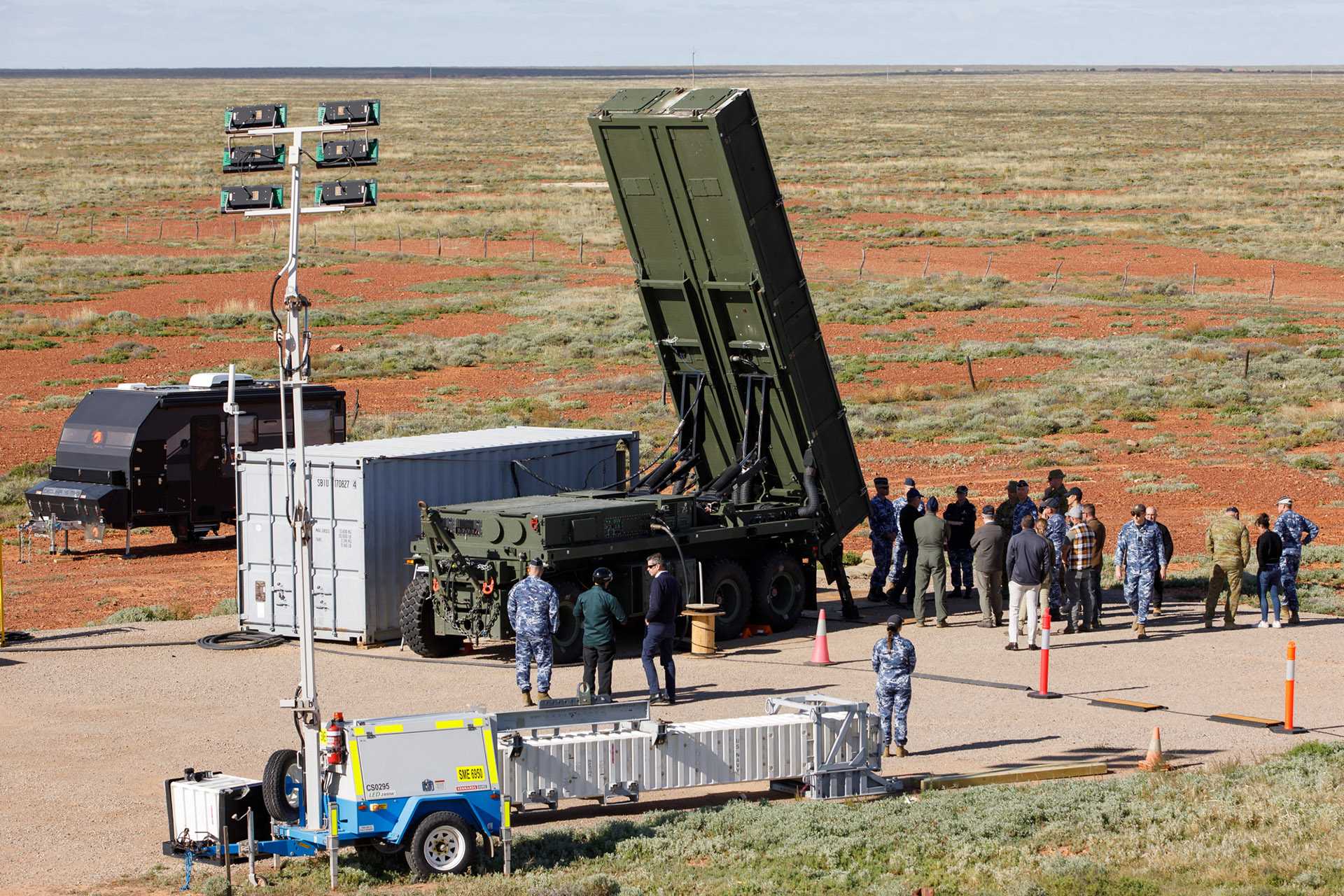 The long-range Derringer trailer-mounted Expeditionary Launch System is displayed during Exercise Taipan Strike 2026 at the Woomera Test Range, South Australia. The system formed part of the live-fire demonstration validating Australia's developmental Aegis-based Medium Range Ground Based Air Defence (MRGBAD) capability, integrating CEA radar, virtualized Aegis command-and-control, and a mobile launcher. (Picture source: Lockheed Martin)