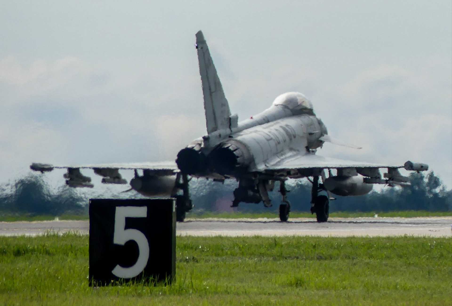An Italian Air Force Eurofighter F-2000 Typhoon fighter jet launches from Šiauliai Air Base in Lithuania during NATO's Baltic Air Policing mission after receiving a Quick Reaction Alert order to intercept two Russian military aircraft over the Baltic Sea on August 3, 2026. (Picture source: Italian Ministry of Defence)