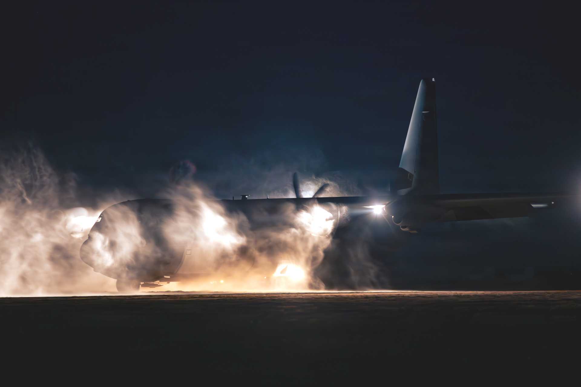 A U.S. Air Force C-130J Super Hercules assigned to the 37th Airlift Squadron maneuvers across a sand landing zone in Rømø, Denmark, during Exercise Northern Viking 26 on August 25, 2026, testing austere landing operations for Arctic and High North missions.