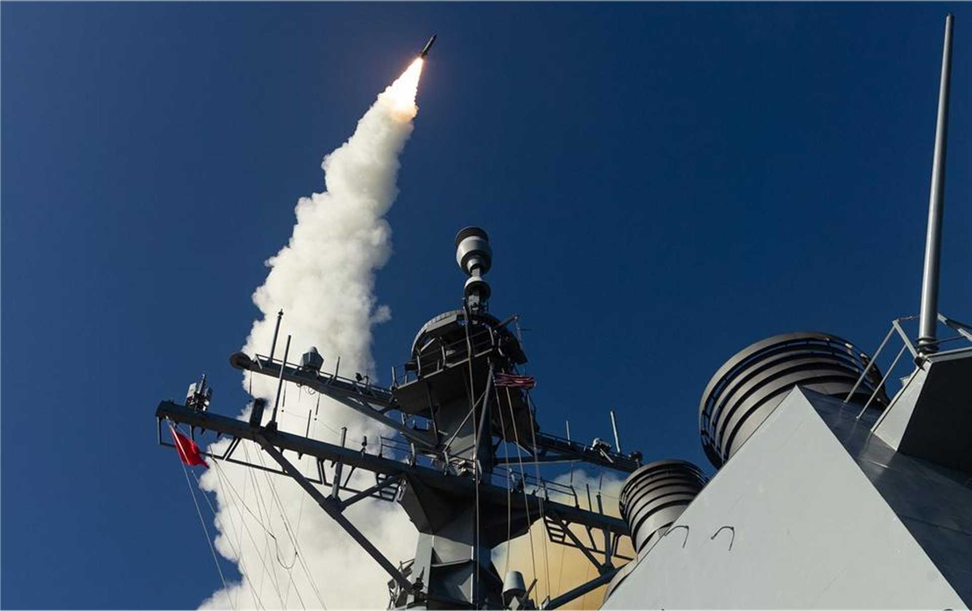 A U.S. Navy Aegis-equipped destroyer launches an SM-3 interceptor during a ballistic missile defense event, highlighting the fleet’s ability to engage ballistic threats outside the atmosphere.