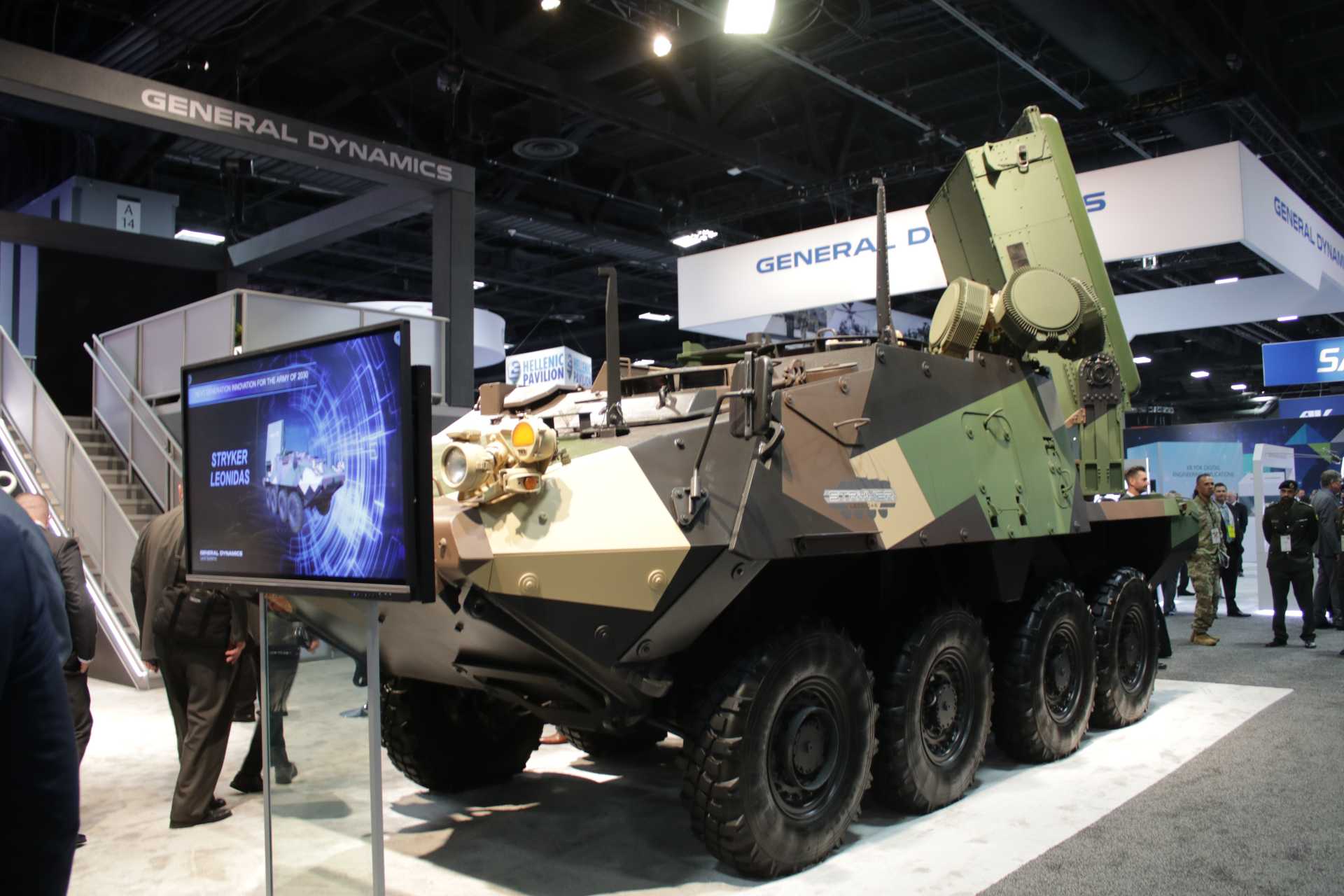 Epirus Leonidas high-power microwave weapon mounted on a Stryker armored vehicle during AUSA 2022, demonstrating a mobile counter-drone configuration designed to disable multiple unmanned aerial systems using directed electromagnetic energy.