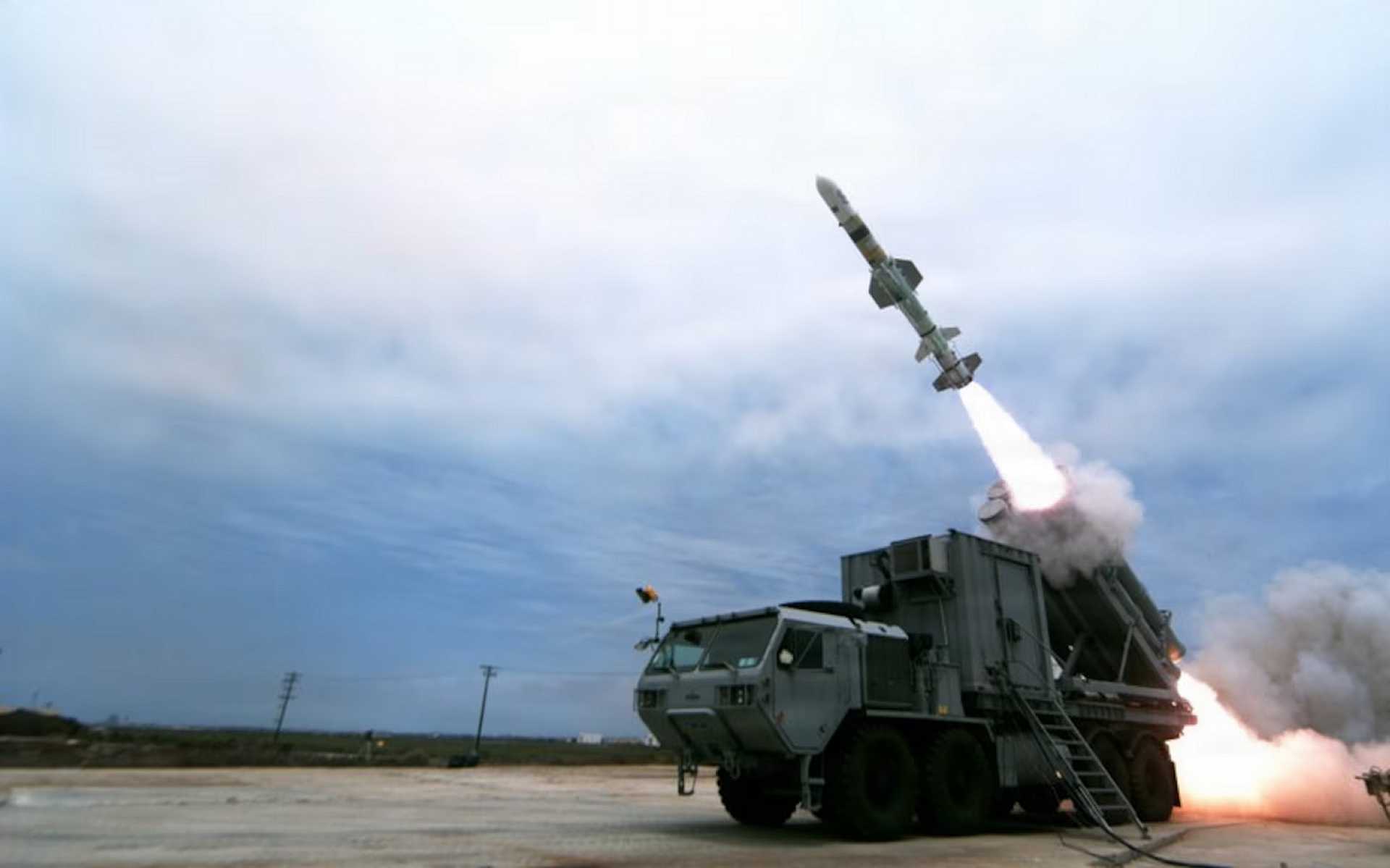 The U.S. Navy Harpoon Coastal Defense System (HCDS) fires a land-based Harpoon anti-ship missile during Developmental Test 1 (DT-1) at Point Mugu Sea Range in California in July 2026, validating its ability to engage maritime targets in littoral waters. (Photo courtesy of Boeing)