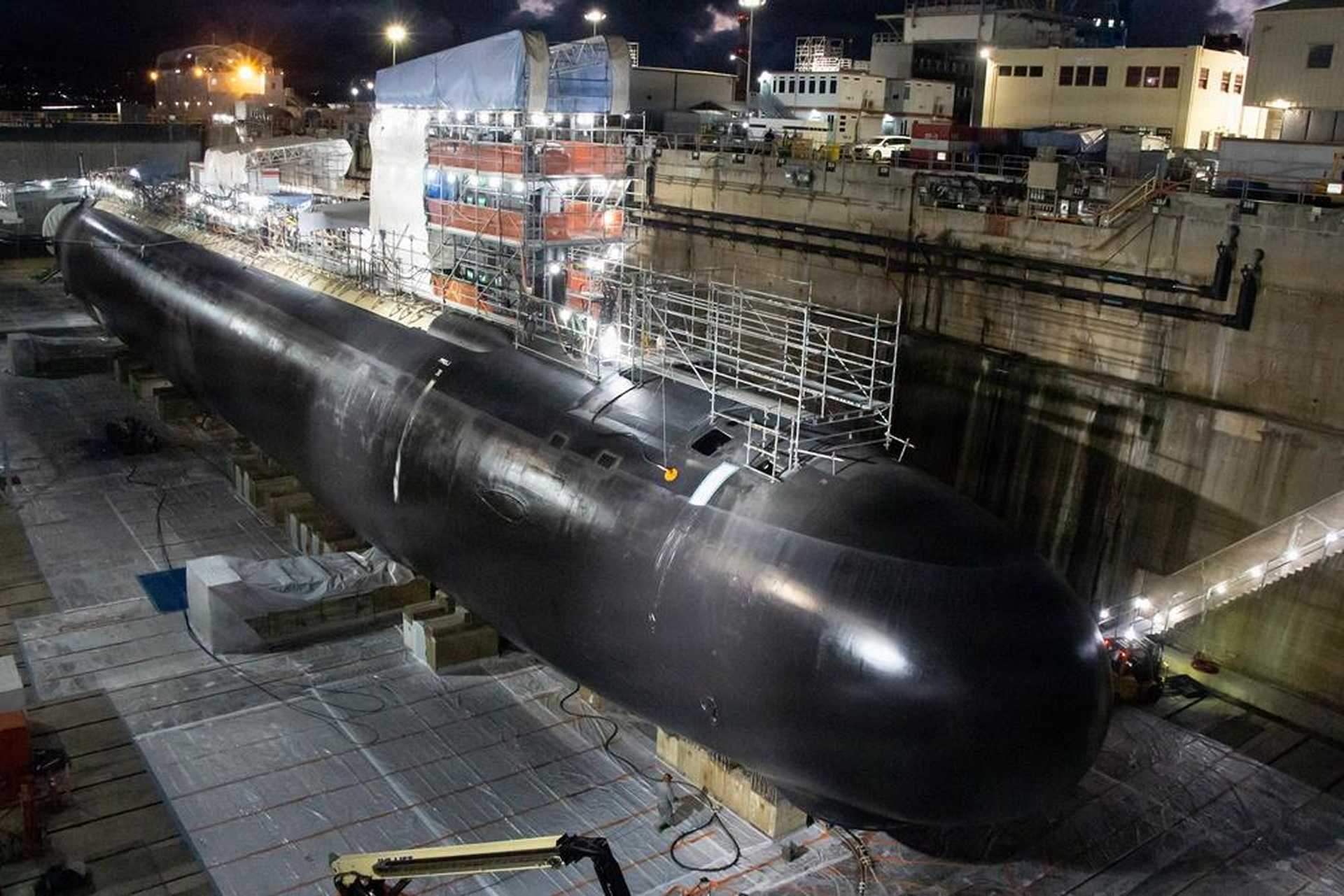 Virginia-class fast-attack submarine USS Colorado (SSN 788) undergoes maintenance at Pearl Harbor Naval Shipyard in Hawaii, highlighting the drydock capacity Trump wants to expand through a proposed fifth public Navy shipyard to improve U.S. submarine readiness in the Indo-Pacific.