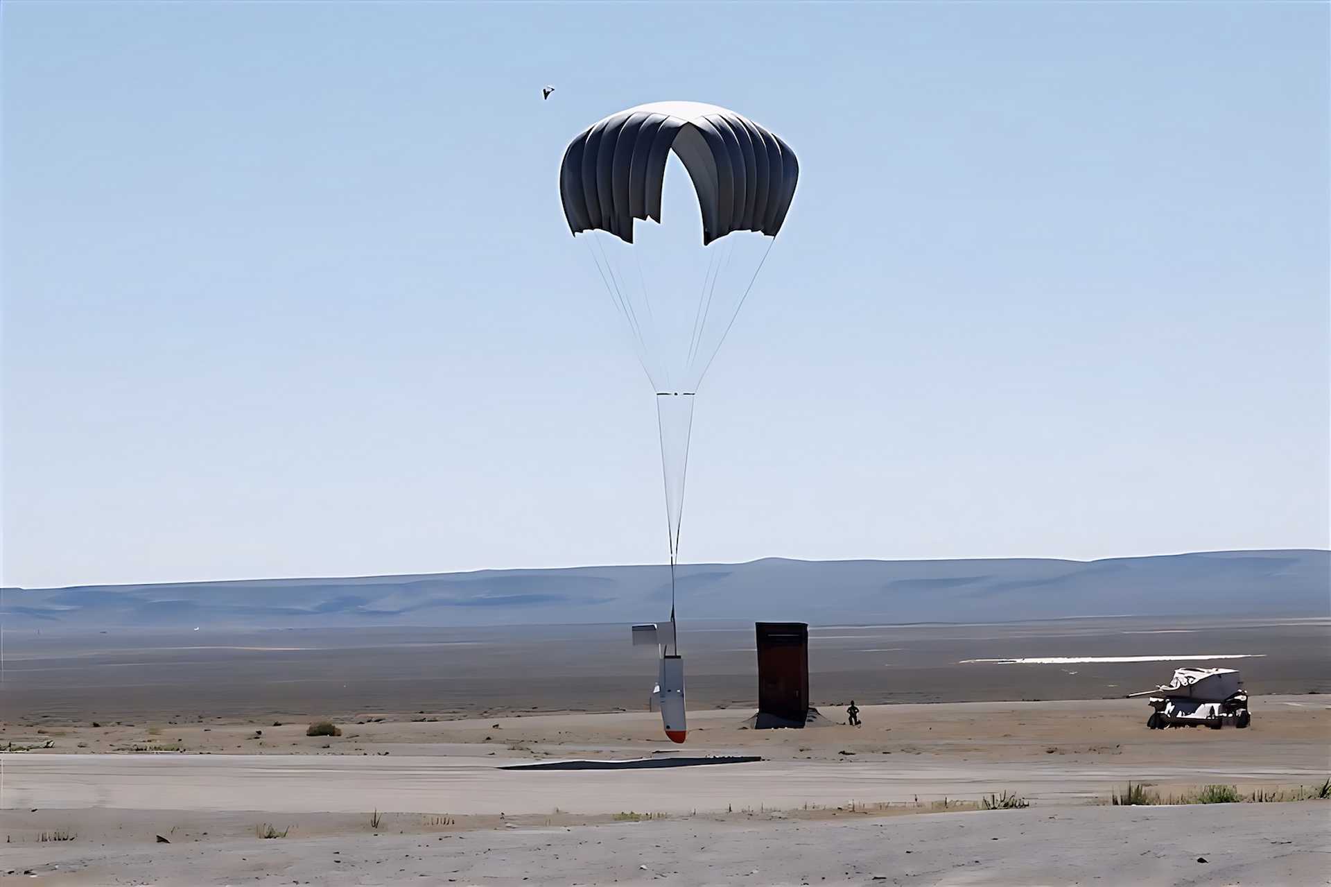 Compared with conducting a conventional C-130 parachute drop, a Grasshopper can carry its 500-lb load autonomously for hundreds of miles after release and then descend by parachute at the destination. (Picture source: Dzyne Technologies)
