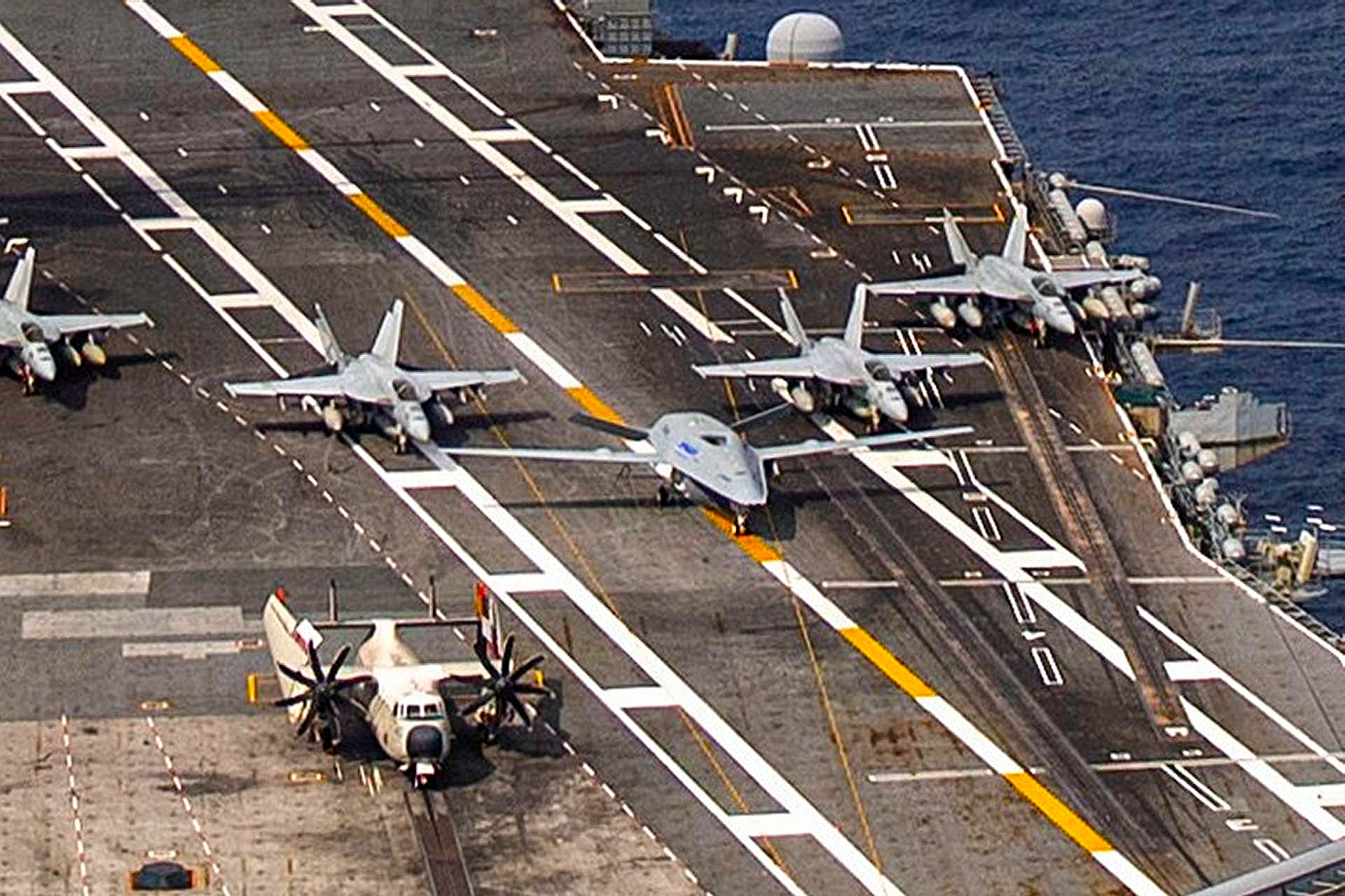 USS Theodore Roosevelt has become the U.S. Navy’s first fully operational and deployable MQ-25-capable aircraft carrier, marking a major step toward routine unmanned carrier aviation (Picture Source: U.S. Navy)