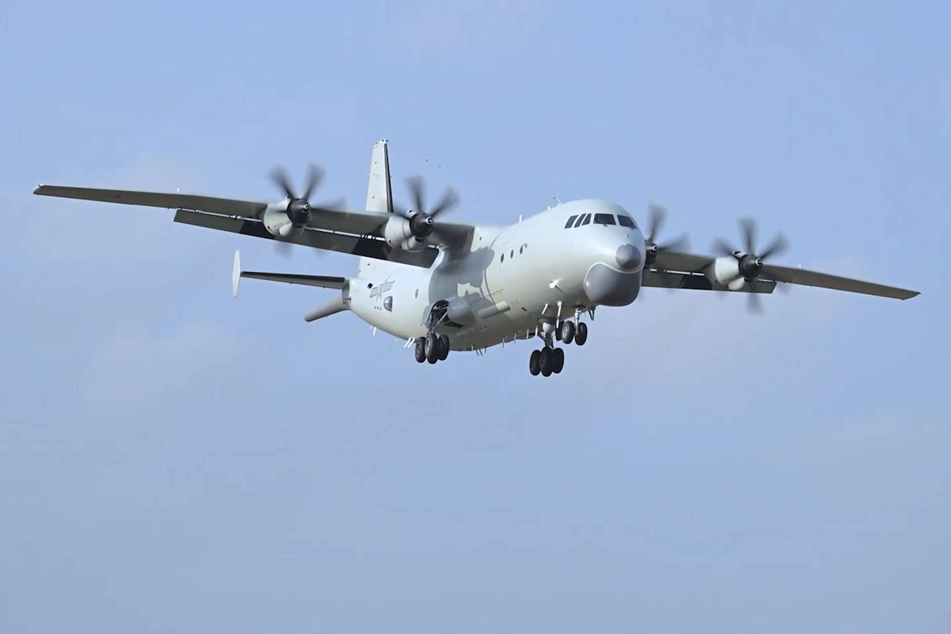 A PLA Naval Aviation KQ-200 maritime patrol aircraft conducts extended anti-submarine training focused on detection, tracking, coordinated handovers and simulated torpedo attacks against submerged targets (Picture source: China MoD).