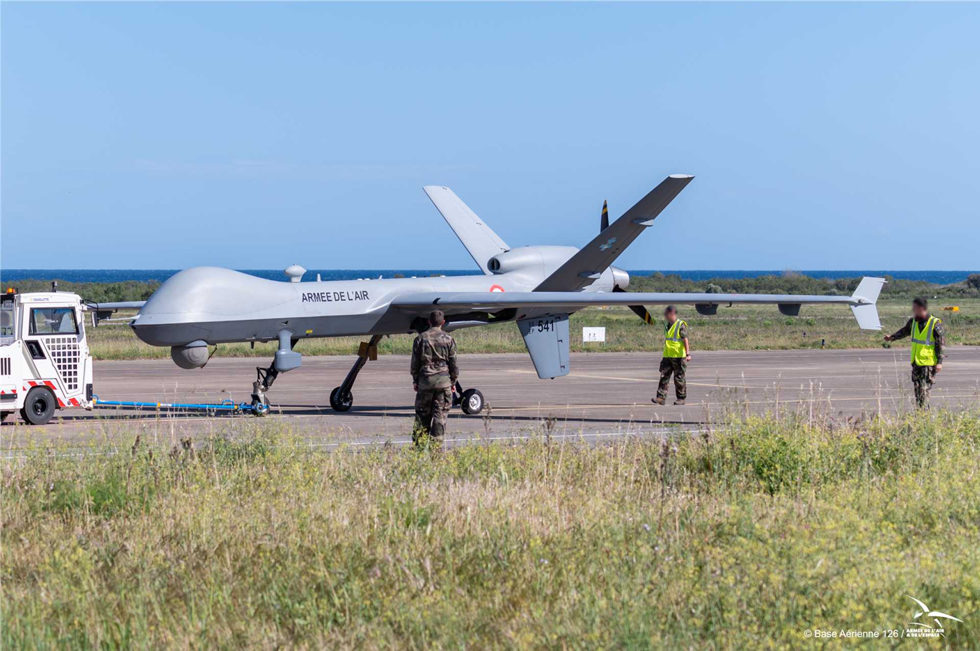 A French Air and Space Force MQ-9 Reaper stands on the flight line before operations. France is expanding the aircraft's mission by integrating AGM-114 Hellfire missiles for counter-drone engagements, reflecting lessons learned from recent conflicts in Ukraine and the Middle East. (Picture source: French Ministry of the Armed Forces)
