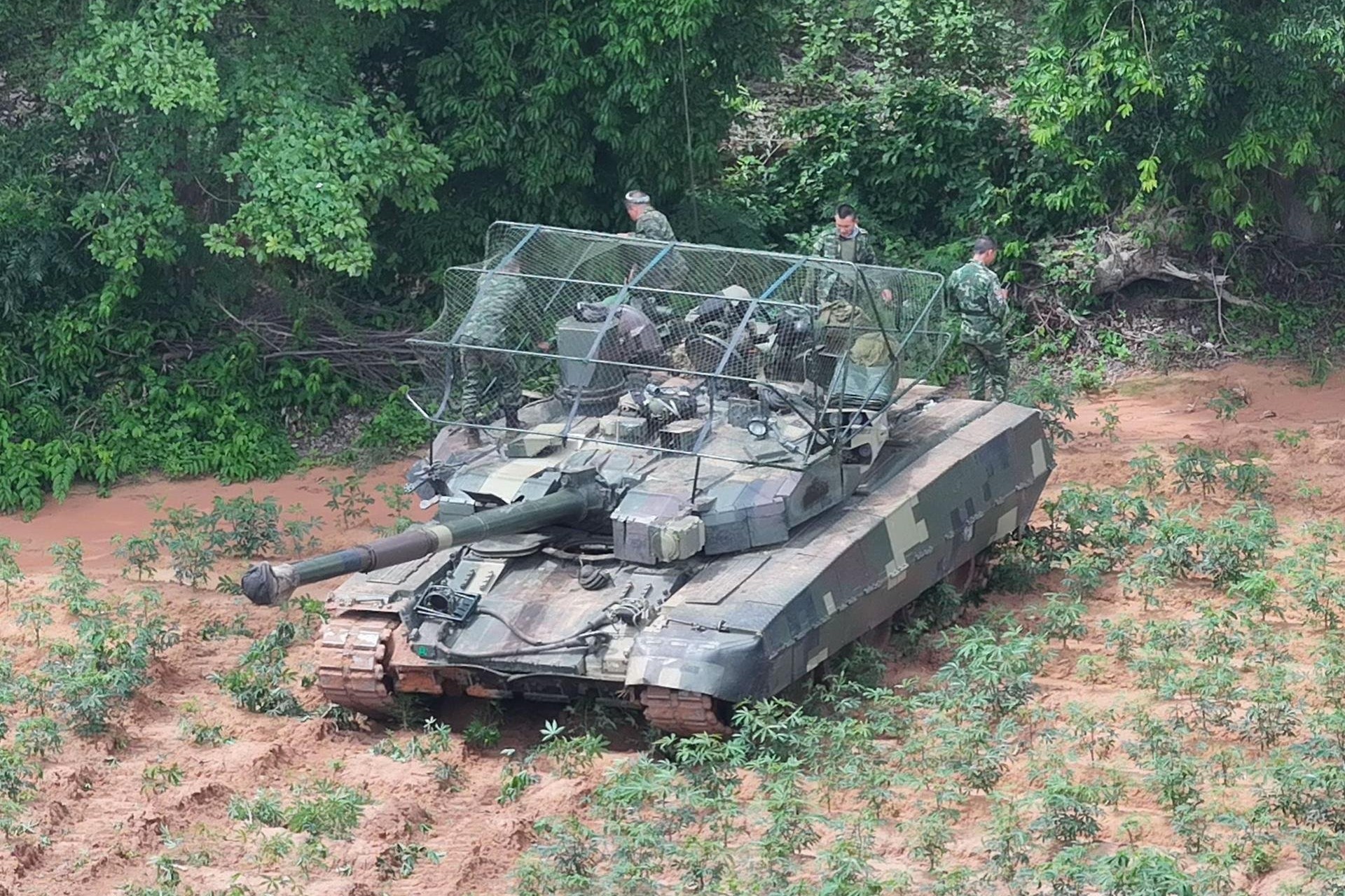 Images appearing to show Royal Thai Army T-84 Oplot-T tanks with foldable overhead mesh suggest Thailand is testing low-cost protection against FPV drone attacks (Picture Source: Social Media)