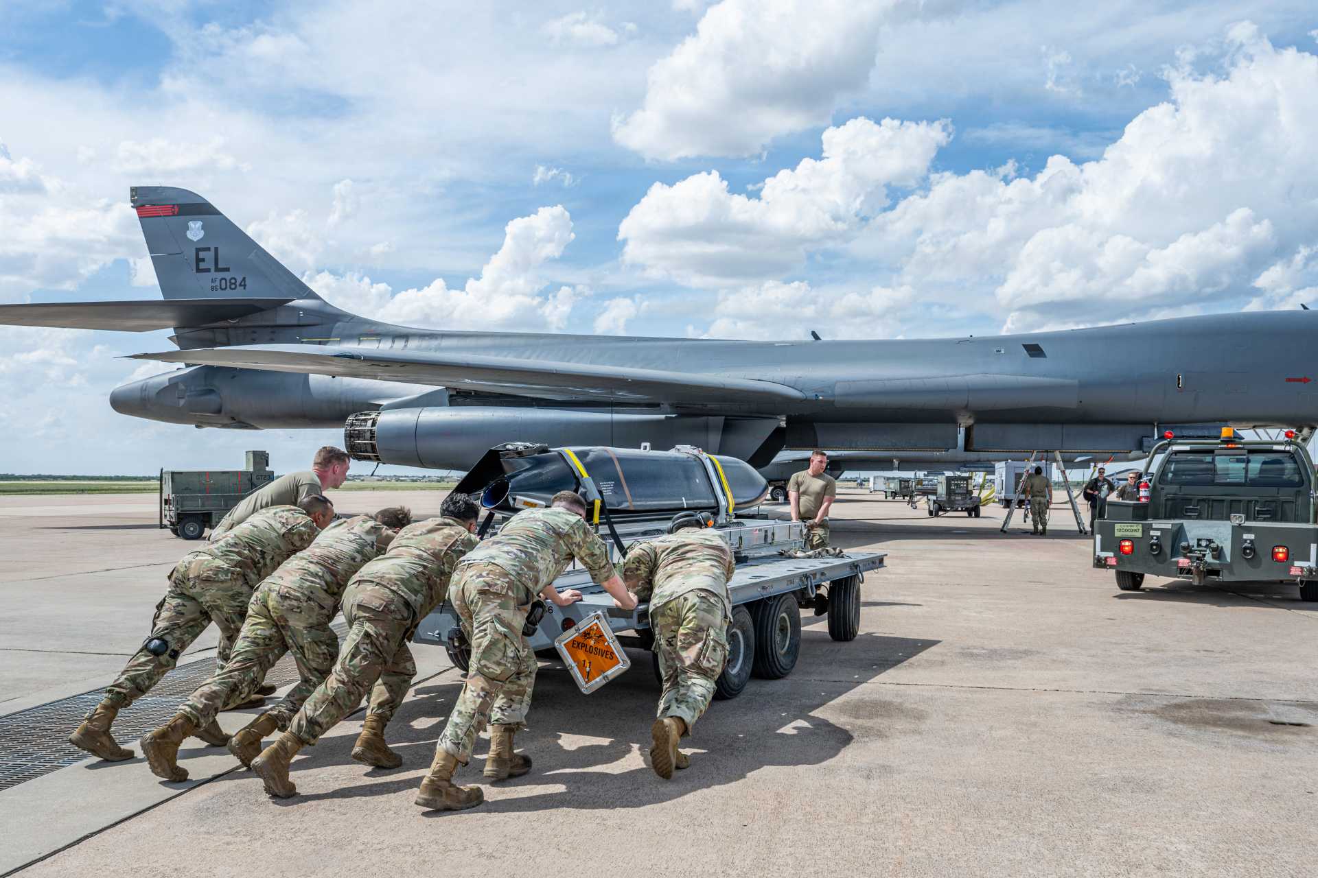 U.S. Airmen position a live AGM-158C LRASM anti-ship missile near a B-1B Lancer bomber during LRASM Event Zero at Dyess Air Force Base, Texas, on June 2, 2026. The event validated updated aircraft and missile software integration procedures.