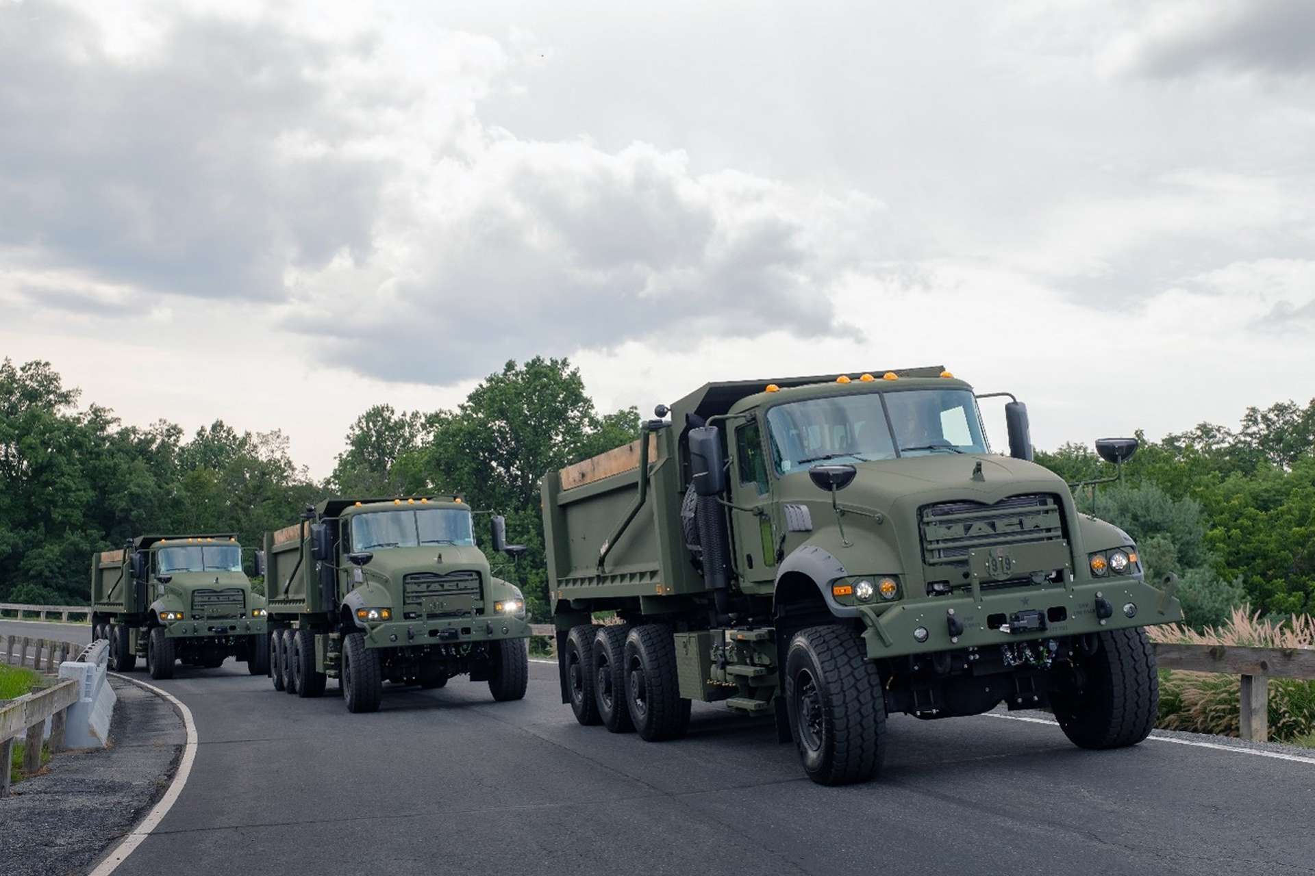 The U.S. Army has ordered 115 additional Mack Defense M917A3 8×8 Heavy Dump Trucks for the Army National Guard, adding protected 27-ton construction vehicles for route repair, airfield development, earthmoving and logistics support in contested and austere environments (Picture source: Mack Defense).