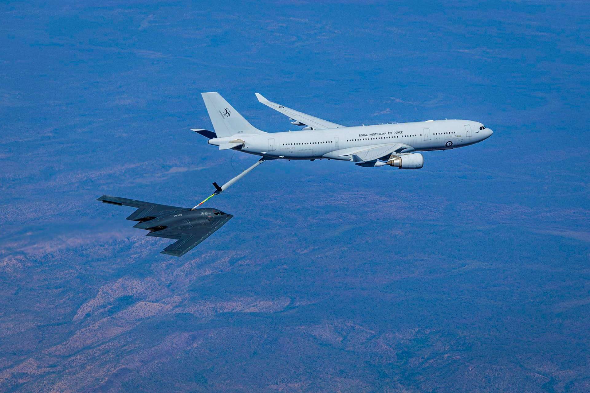 A Royal Australian Air Force KC-30A refuelled a U.S. Air Force B-2 Spirit during Exercise Diamond Storm 26, extending allied long-range strike reach across the Indo-Pacific (Picture Source: Royal Australian Air Force)