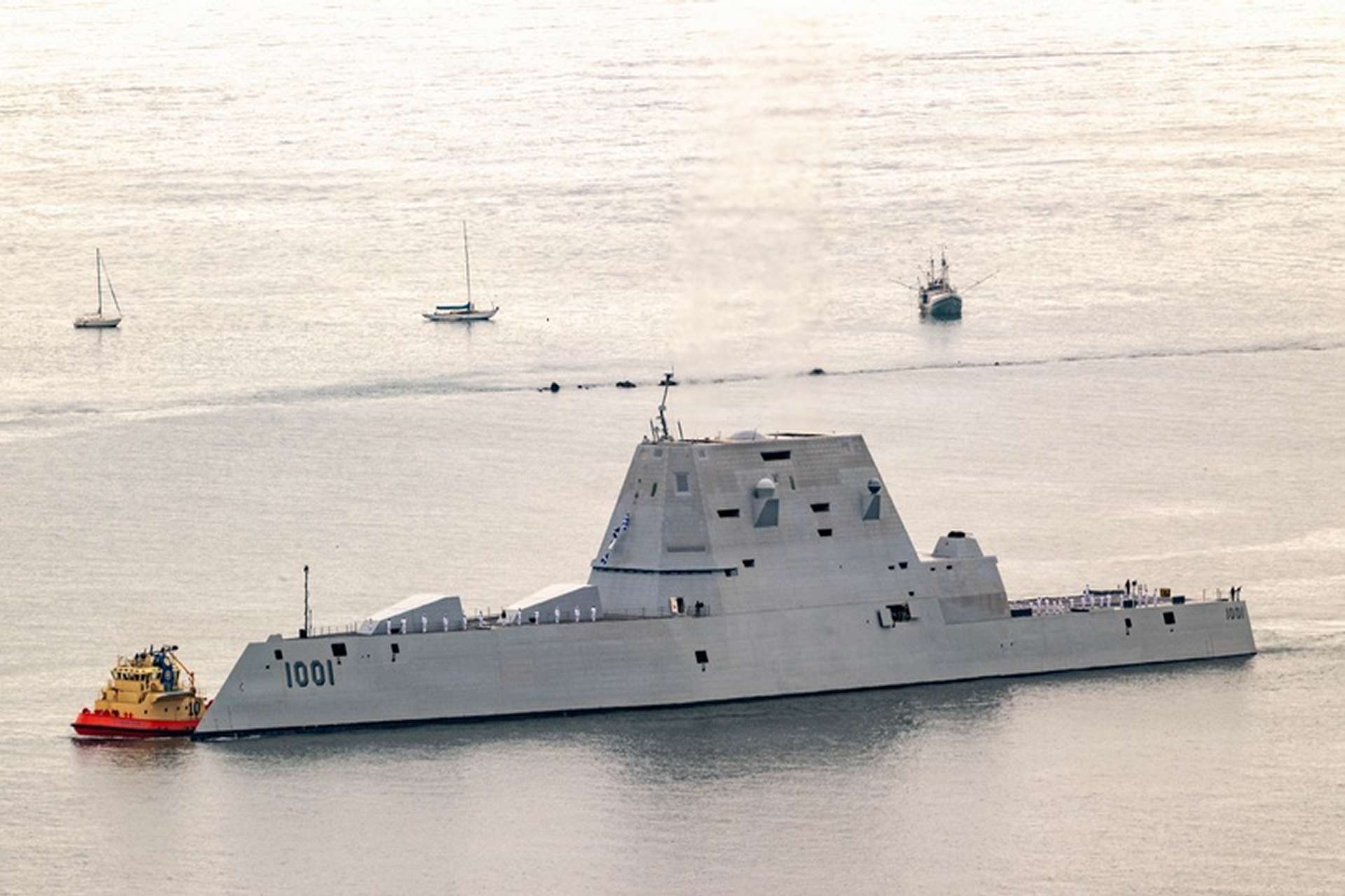 A Zumwalt-class destroyer is shown at sea. The U.S. Navy is modernizing all three ships of the class to carry up to 12 Conventional Prompt Strike hypersonic missiles, although the program is currently running about two years behind schedule (Picture source: U.S. DoW).