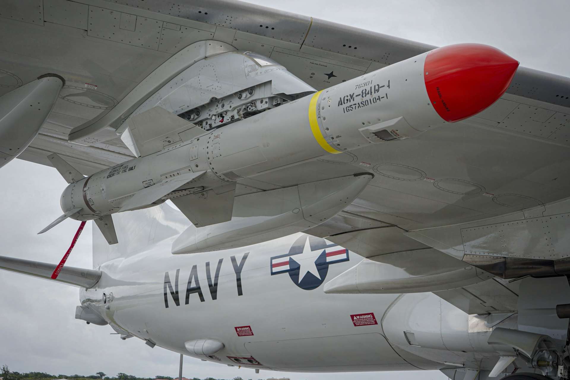 A U.S. Navy P-8A Poseidon armed with an AGM-84D Harpoon in Guam highlights growing U.S. and allied maritime strike readiness for sea-denial operations across the Indo-Pacific (Picture Source: U.S. Navy)