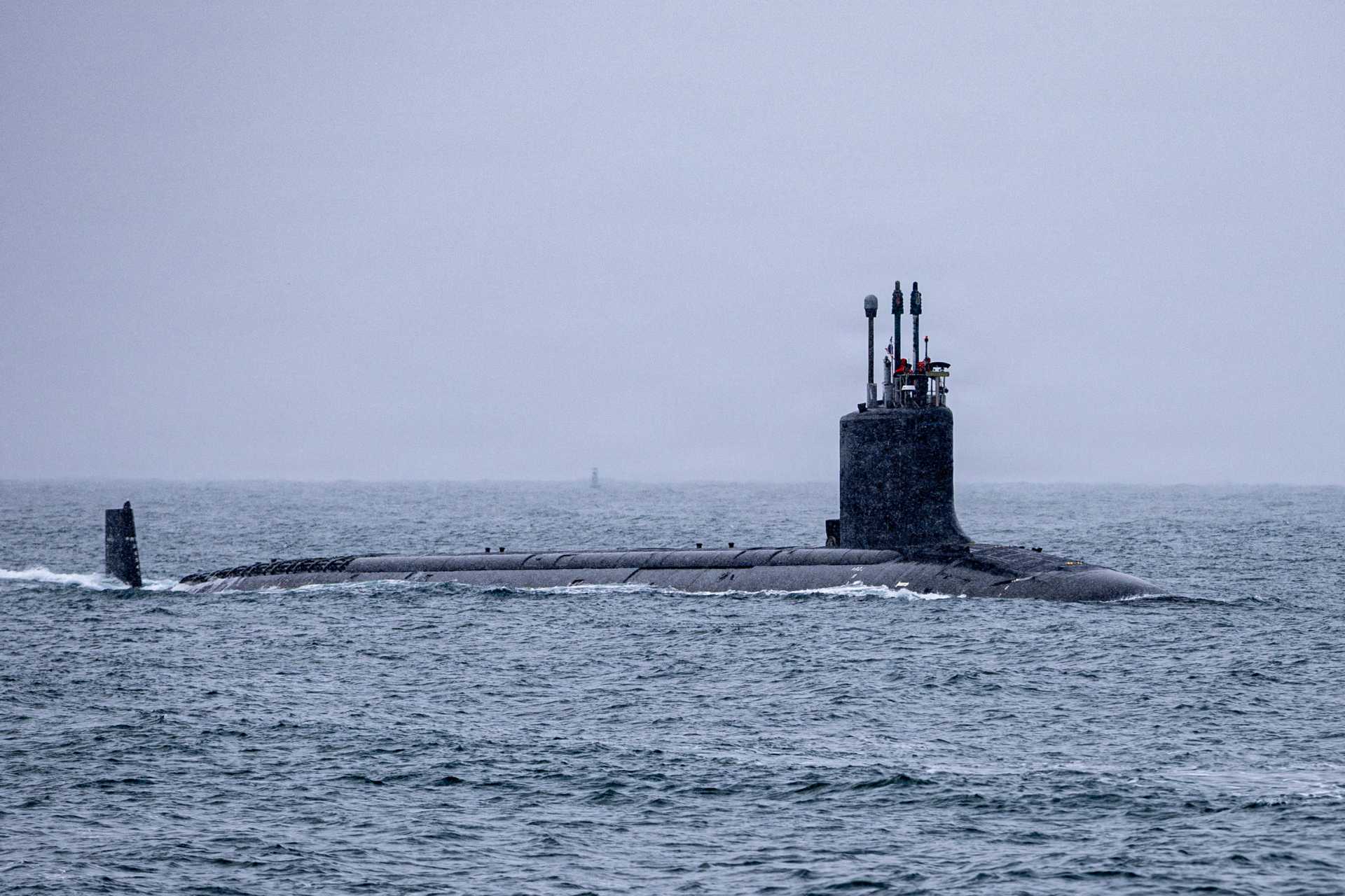 The Virginia-class attack submarine USS New Mexico (SSN 779) arrives at Portsmouth Naval Shipyard for scheduled maintenance on February 21, 2026. The U.S. Navy is equipping both new-construction and in-service submarines with advanced Lockheed Martin electronic warfare systems to enhance survivability against increasingly capable submarine and maritime threats from China and Russia.