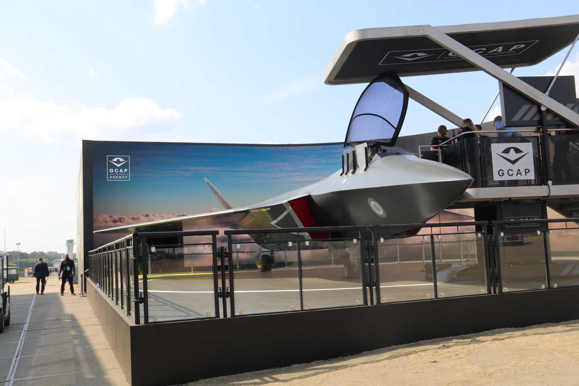 Scale model of the Global Combat Air Programme (GCAP) next-generation combat aircraft displayed at the Farnborough International Airshow 2026, illustrating the trilateral sixth-generation fighter project being jointly developed by the United Kingdom, Italy, and Japan. (Picture source: Army Recognition Group)