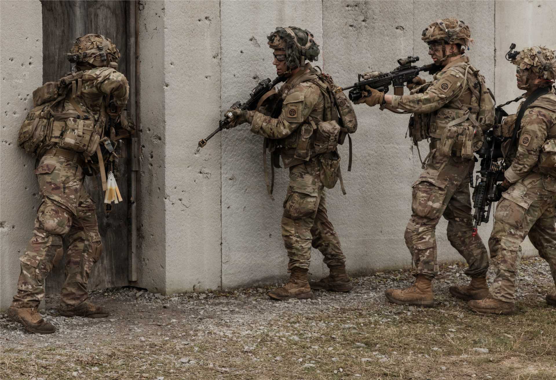 U.S. Army paratroopers assigned to the 3rd Brigade Combat Team, 82nd Airborne Division, conduct close-quarters battle training during a live-fire exercise at the Joint Readiness Training Center, Fort Polk, Louisiana, March 10, 2026, demonstrating rapid-response combat capabilities aligned with potential deployment scenarios supporting Project Freedom and maritime security operations.