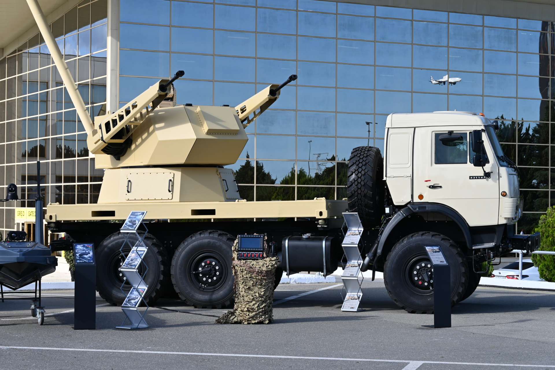 Azerbaijani defence company Zireh unveiled the HMS30 mobile air defence system at ADEX 2026, combining twin 30mm cannons, electro-optical tracking, and a remotely operated turret to detect and engage unmanned aerial threats (Picture Source: Army Recognition Group)