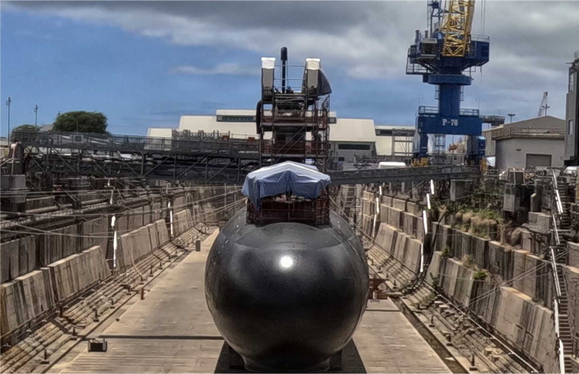 The Virginia-class fast-attack submarine USS North Carolina (SSN 777) prepares to undock from Dry Dock 1 at Pearl Harbor Naval Shipyard and Intermediate Maintenance Facility on August 10, 2026, marking the completion of the dry-dock phase of its restoration and modernization work. (Picture source: U.S. Department of War/Defense)