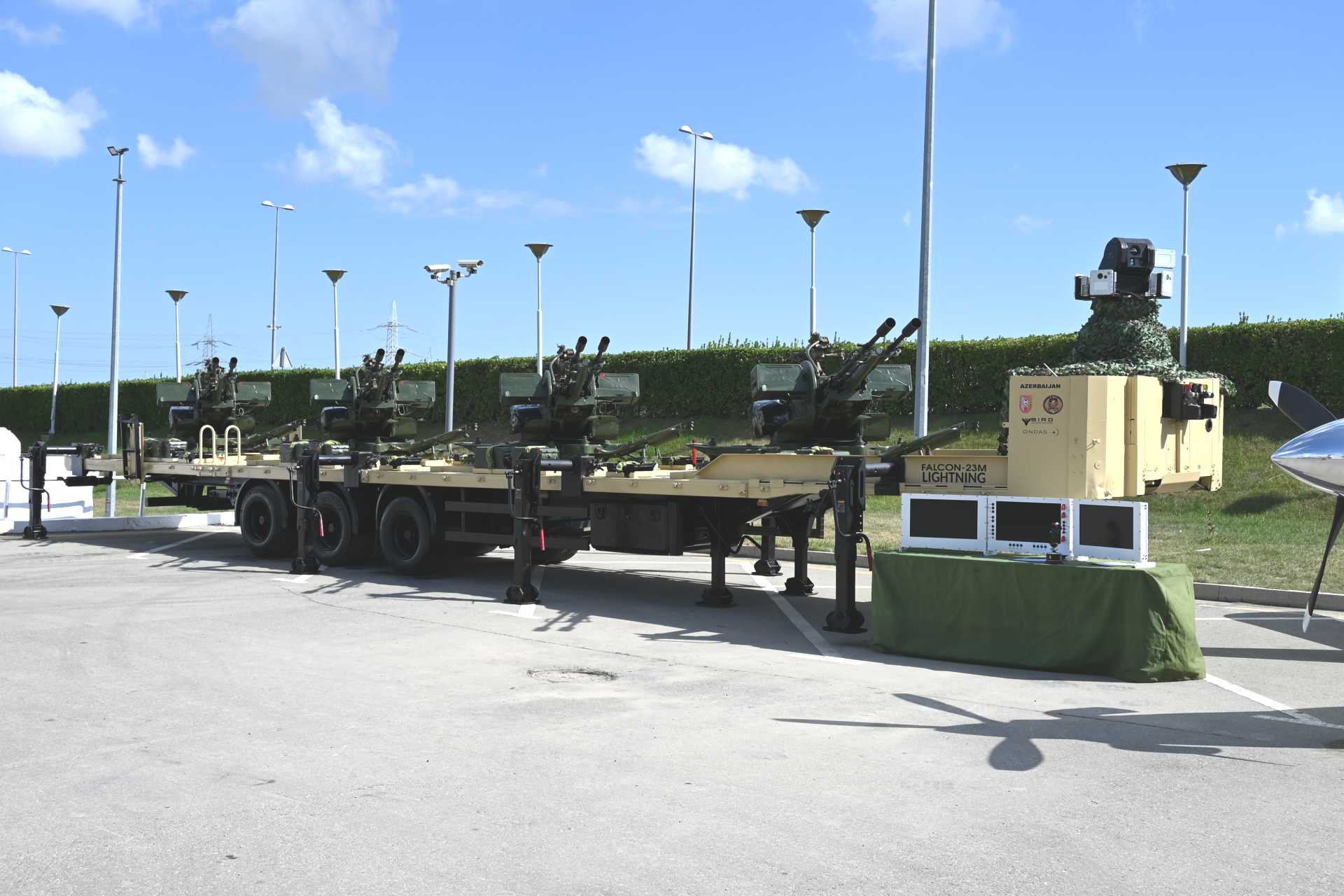 FDI Technology Falcon Dynamic Systems unveiled the Falcon 23-4M Lightning counter-drone air defense system at ADEX 2026, combining four ZU-23-2 twin 23 mm gun mounts with BIRD radar, electro-optical sensors, automated tracking, and centralized fire control. Designed for fixed or semi-fixed site defense, the system is intended to provide a lower-cost hard-kill response against drones and other low-flying threats.