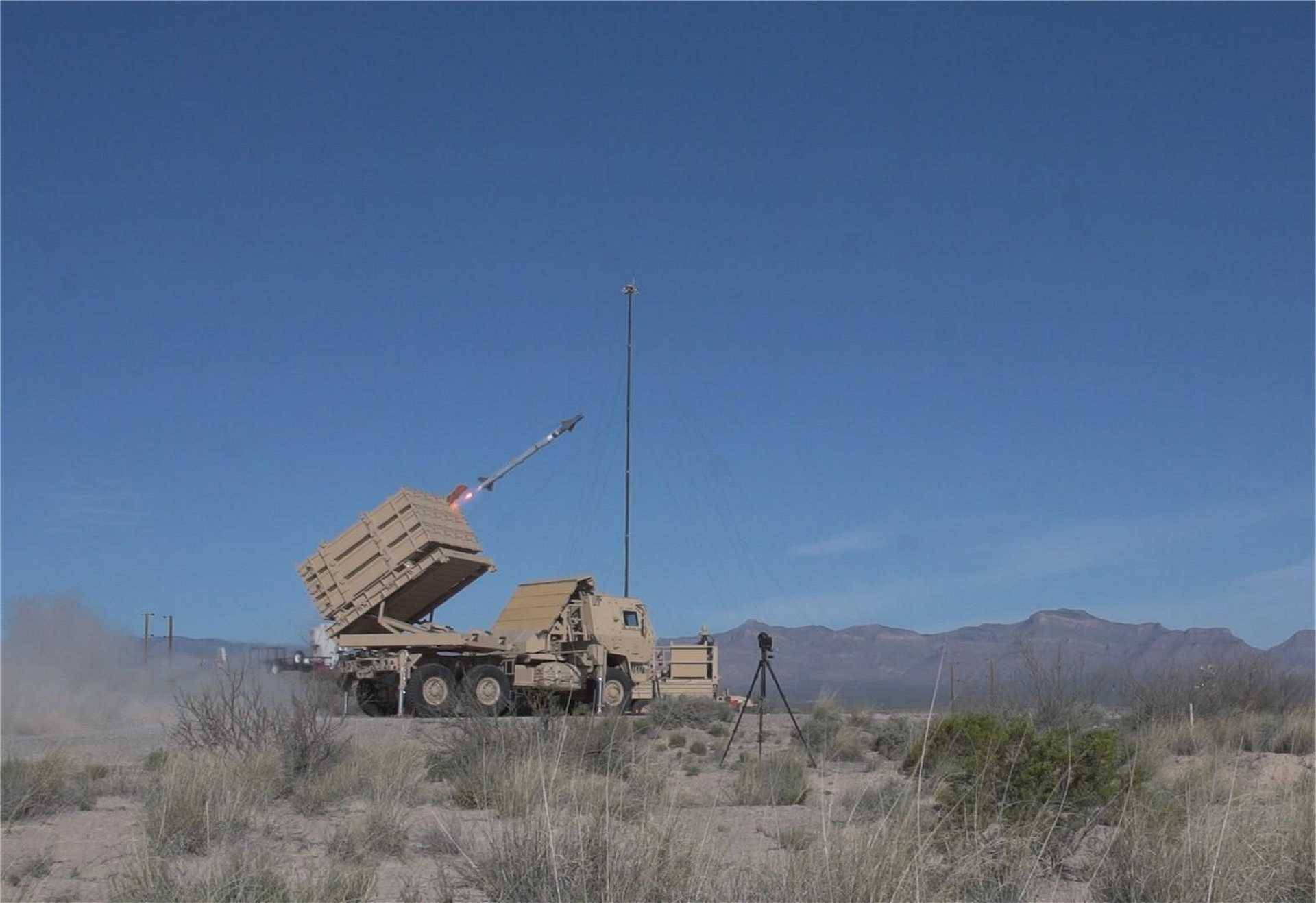 A U.S. Army Indirect Fire Protection Capability (IFPC) missile launcher is raised into position during operations at White Sands Missile Range, New Mexico, on July 28, 2026. The U.S. Army has selected four companies to develop affordable interceptors for potential integration with its IFPC air-defense architecture. (Picture source: U.S. Army / Sgt. Michael Majors)