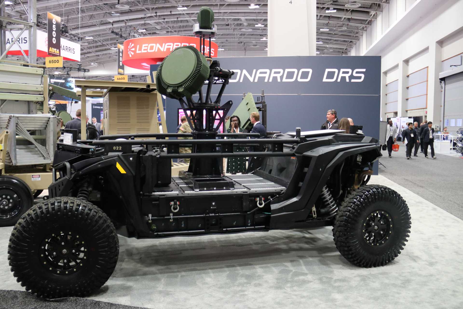 Overland AI’s ULTRA 4x4 unmanned ground vehicle displayed at the Leonardo DRS booth during AUSA 2026, equipped with a Multi-Mission Hemispheric Radar for aerial-threat detection and tracking. (Picture source: Army Recognition Group)