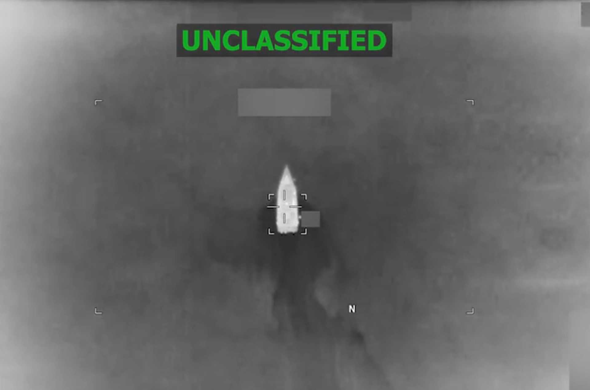 A go-fast vessel identified by U.S. Southern Command as involved in narcotics trafficking is seen in the Caribbean shortly before it was destroyed in a U.S. military strike on October 4, 2026.