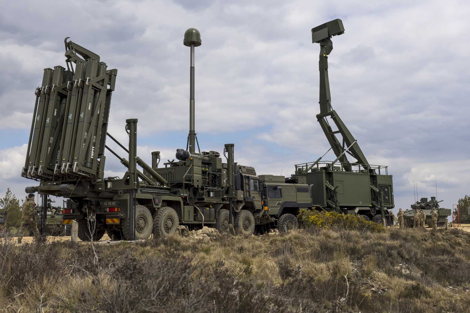 The proposed £10 billion Britannia Shield integrated air and missile defense network would protect military bases and critical infrastructure from missiles and drones by combining radar surveillance aircraft, ground-based interceptors, laser weapons, and counter-drone systems. (Picture source: UK MoD)