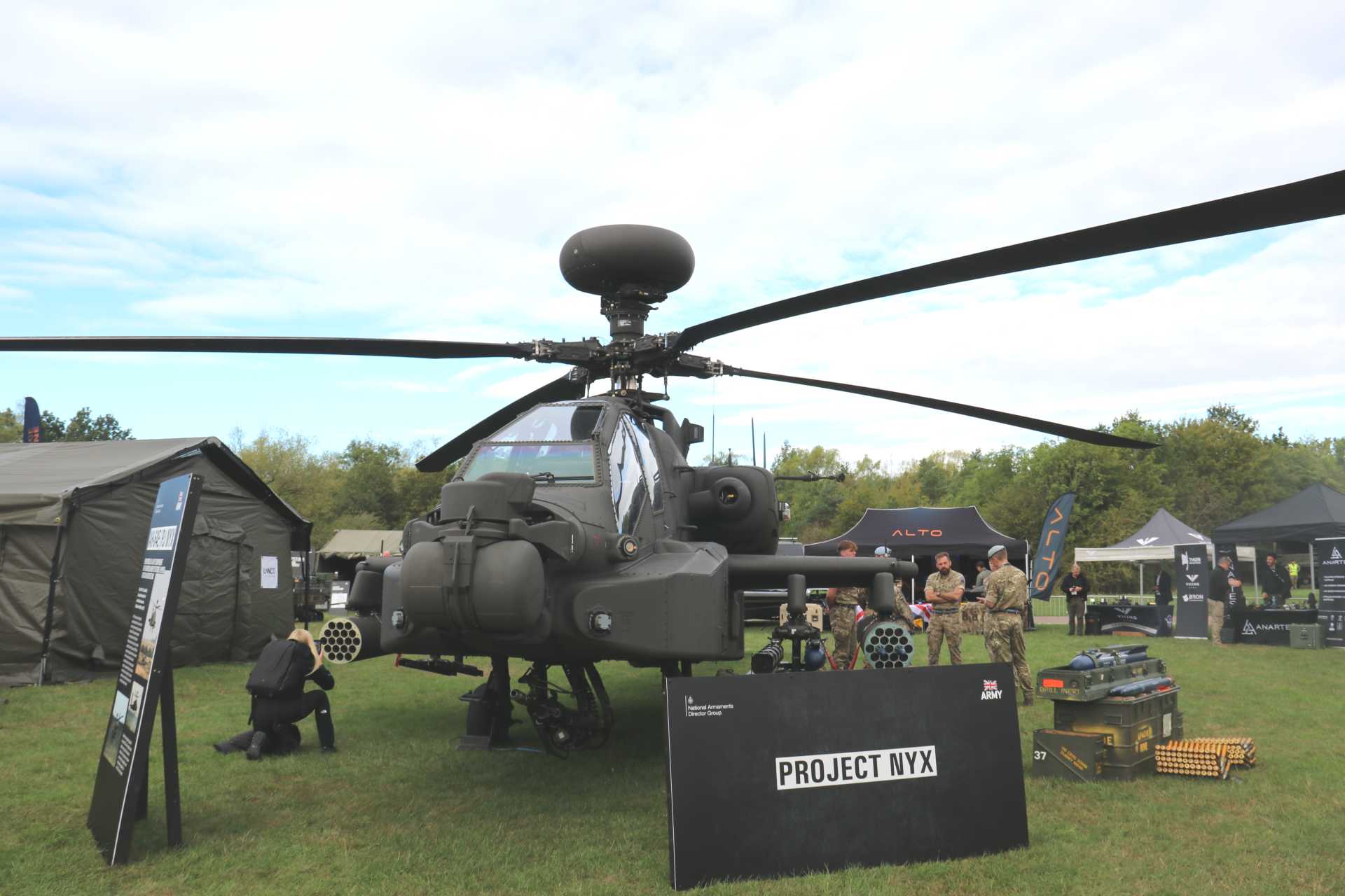 British Army Project NYX is set to expand the operational capabilities of the U.S.-made AH-64E Apache by teaming attack helicopters with armed autonomous drones for reconnaissance targeting electronic warfare and precision strike missions in high-threat environments.