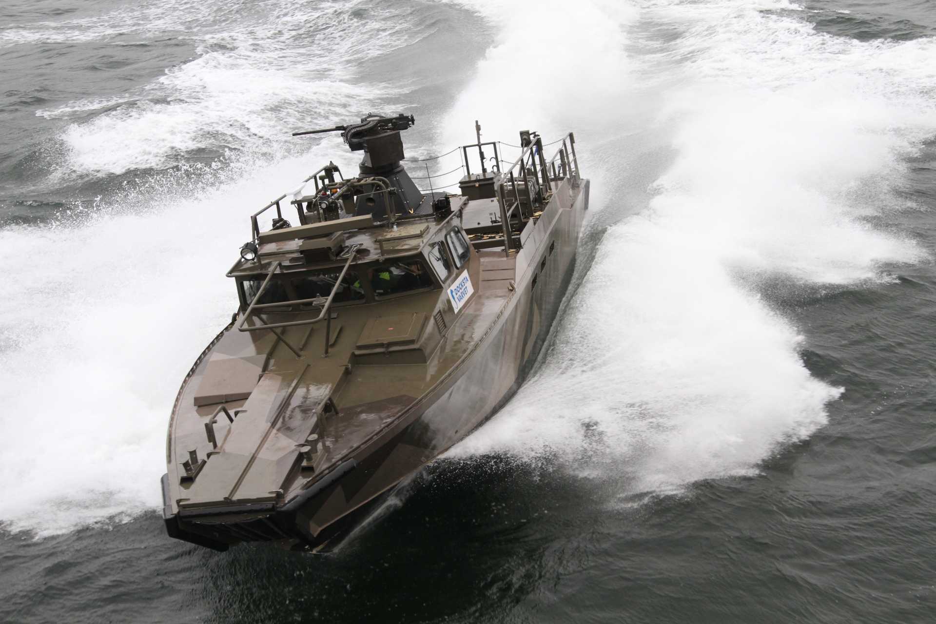 The CB90 is a Swedish fast assault craft designed to move 18 equipped troops directly onto shallow shorelines at 40 to 45 knots, combining a 0.8 to 0.9 m draught and twin-waterjet propulsion with up to 1,800 hp. (Picture source: Saab)