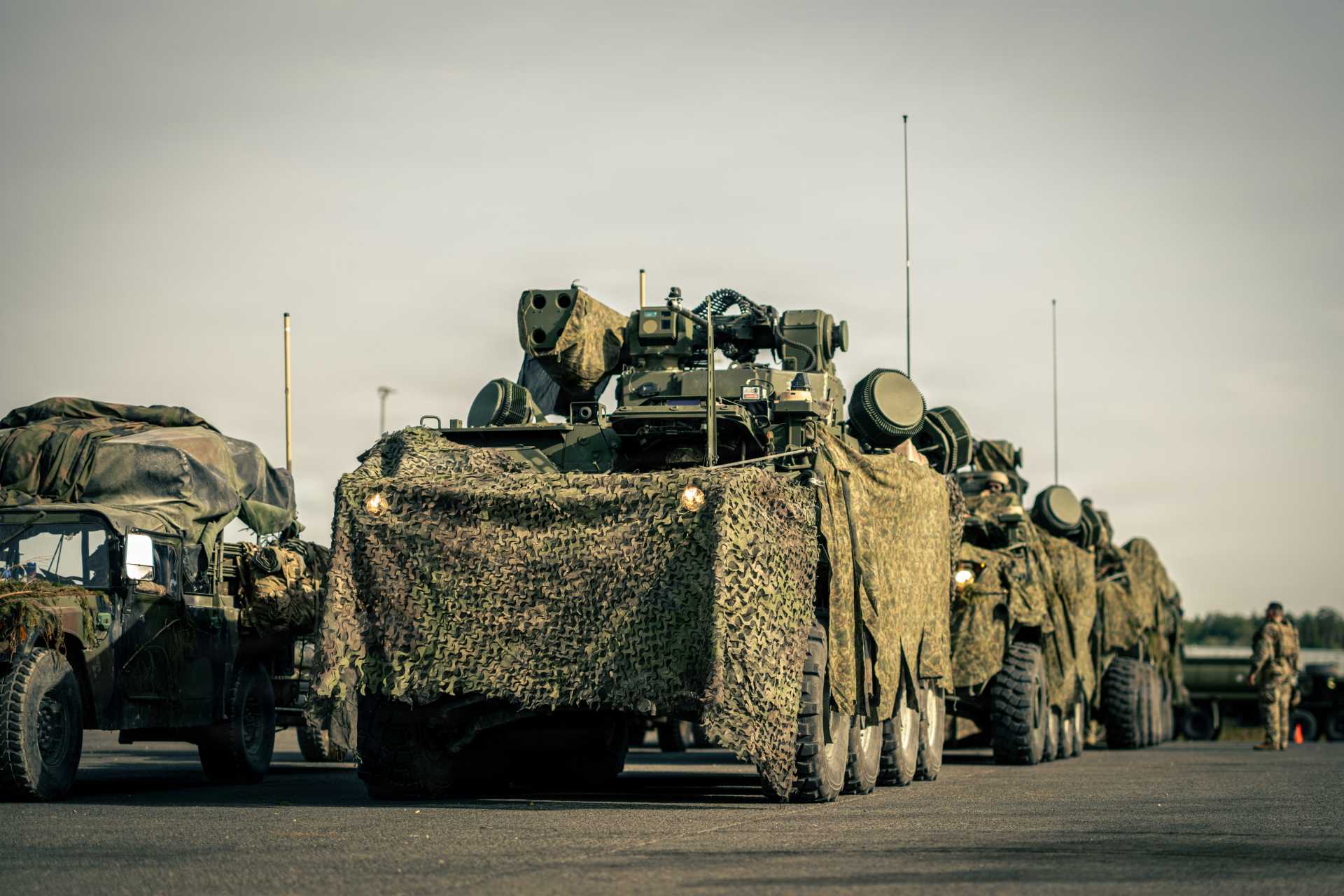 U.S. Army SGT STOUT Maneuver Short-Range Air Defense vehicles from A Battery, 5th Battalion, 4th Air Defense Artillery Regiment, prepare to enter the training area during Saber Junction 26 at Hohenfels, Germany, on August 27, 2026. The vehicles were employed to strengthen counter-UAS protection for artillery units and help shield firing positions from drone-directed targeting.