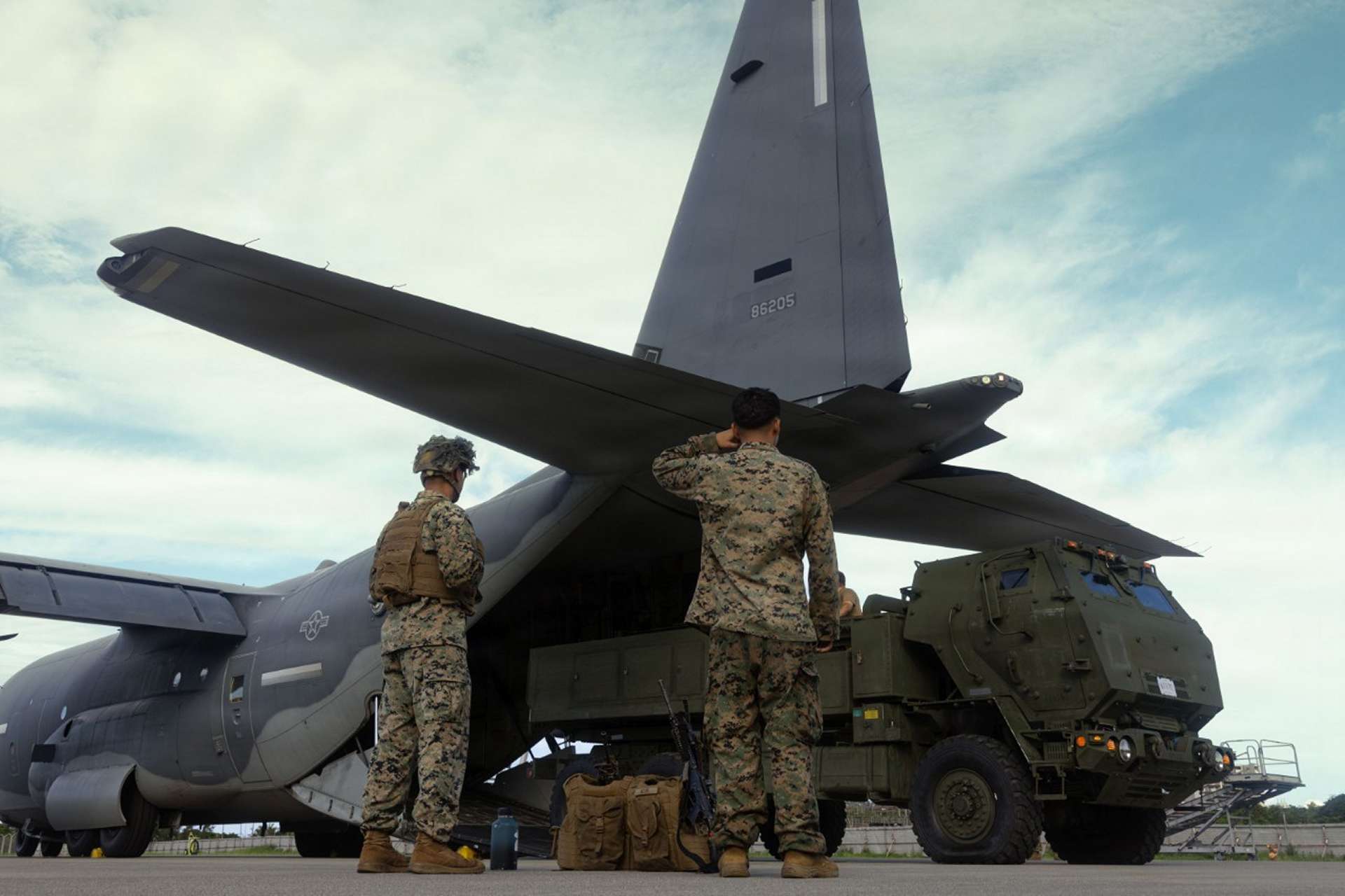 U.S. Marines rapidly airlifted and deployed a HIMARS launcher aboard a KC-130J in Japan, demonstrating the ability to reposition long-range firepower across dispersed Pacific locations (Picture Source: U.S. Marine Corps)